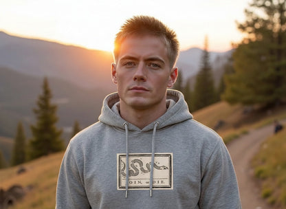 
Join or Die Flag hoodie in Carbon Grey, worn by male model