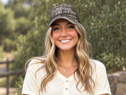 In God We Trust Camouflage Trucker Cap - female model